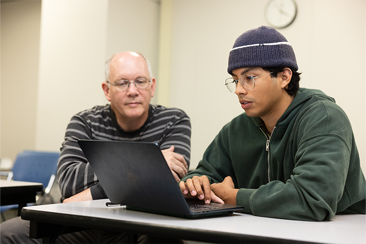 Math professor mentoring math student